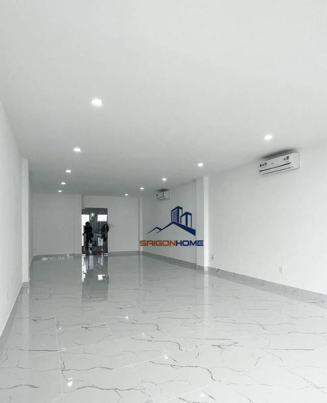 Toà văn phòng 450m2 hầm 4 tầng sàn trống-thang máy