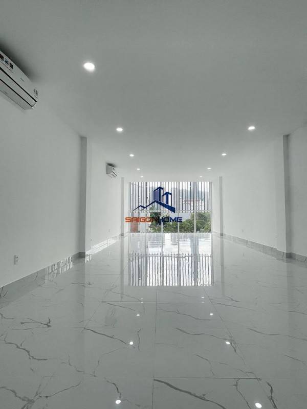 Toà văn phòng 450m2 hầm 4 tầng sàn trống-thang máy